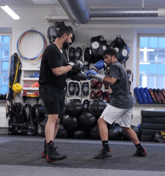 Coach visar teknik under Power & Rotation