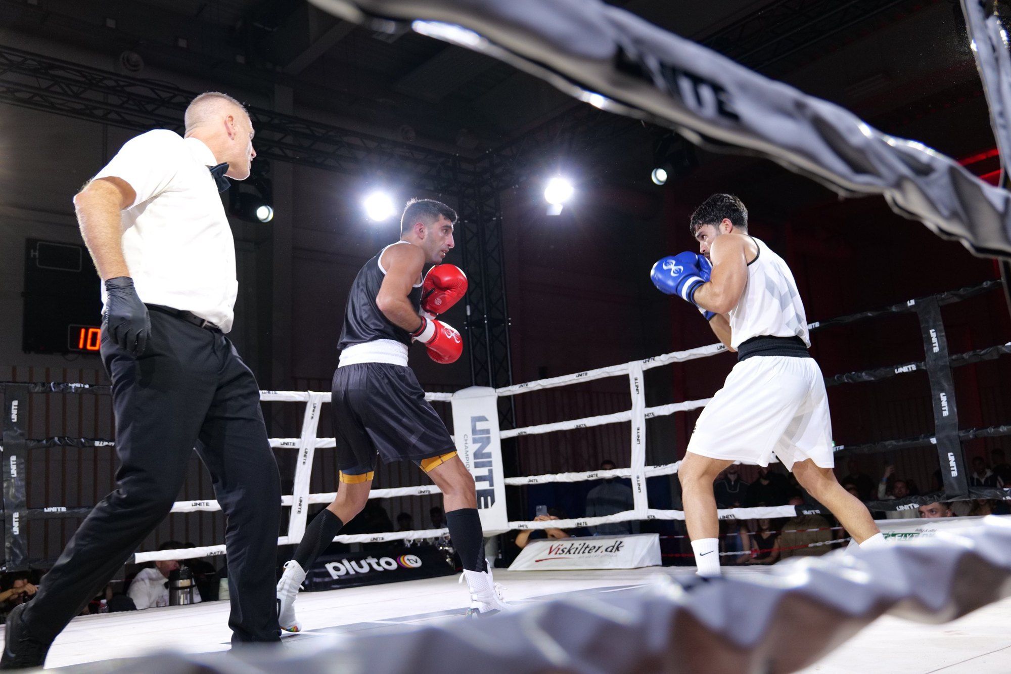 Boxing match in the ring at Road to Unite